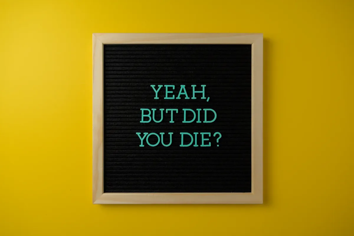 A vibrant motivational message board with text on a bright yellow background.