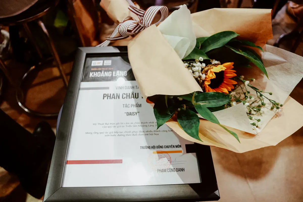 Close-up of a sunflower bouquet with award certificate indoors captured with a Canon DSLR.
