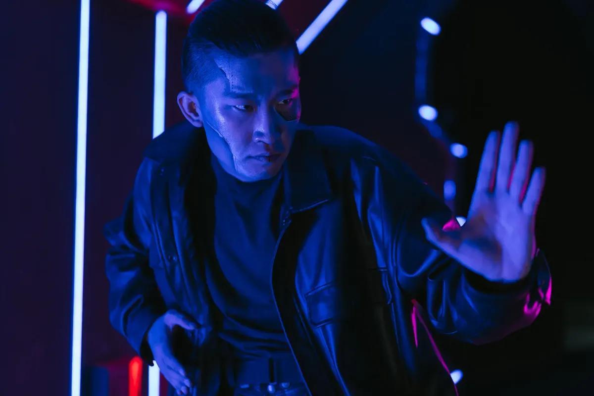 A futuristic cyberpunk style portrait of a person in neon light.
